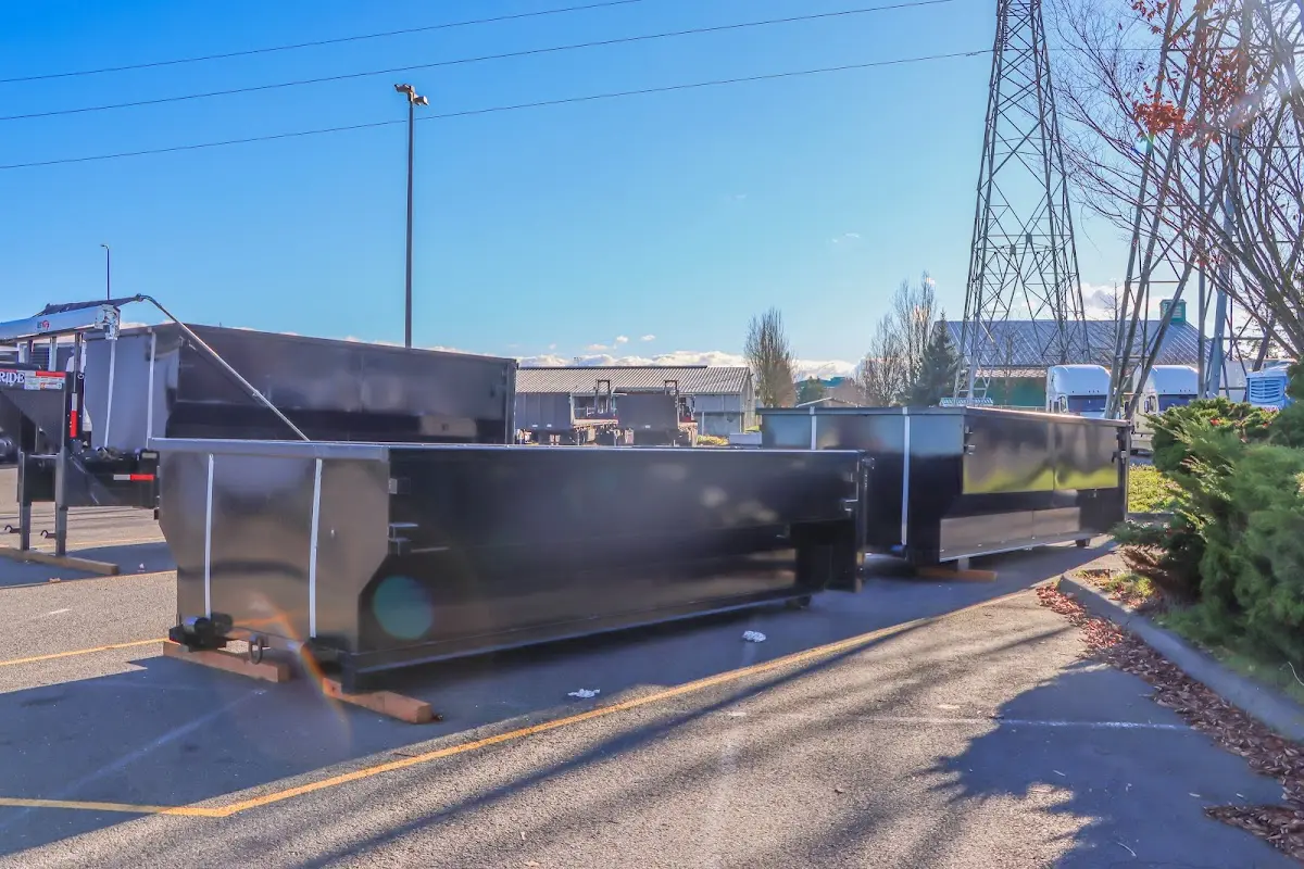 Roll-off dumpster ready for waste disposal at job site for Construction Dumpster Rental in Liberty Triangle
